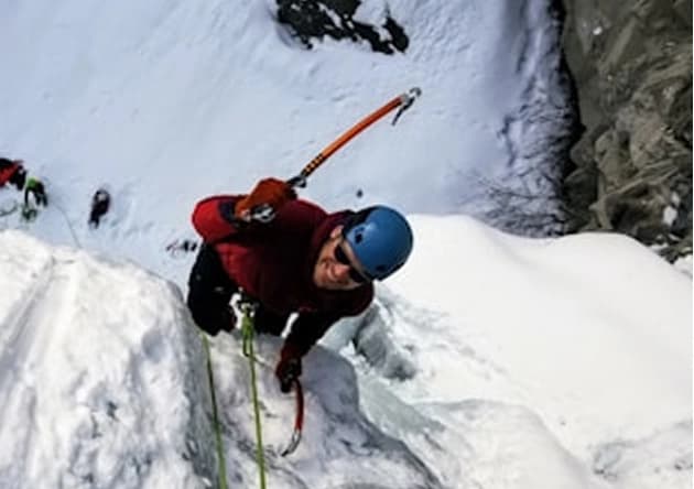 Guide climbing on ice
